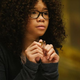 Meg and a picture of her father, from A Wrinkle in Time.